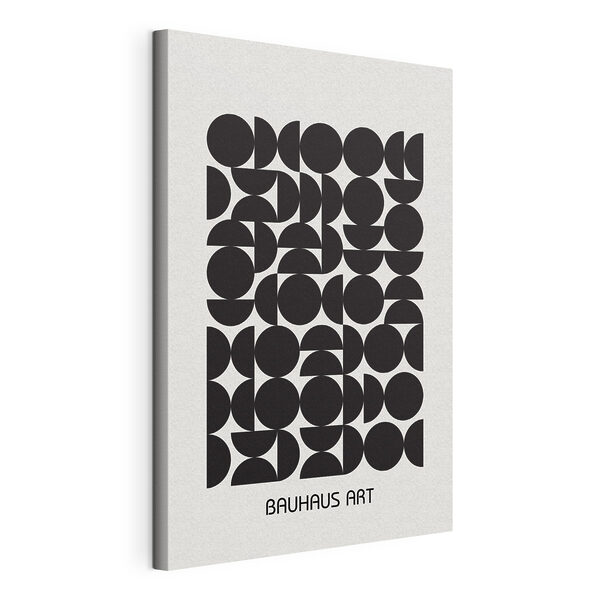 A black and white pattern of circles and half circles