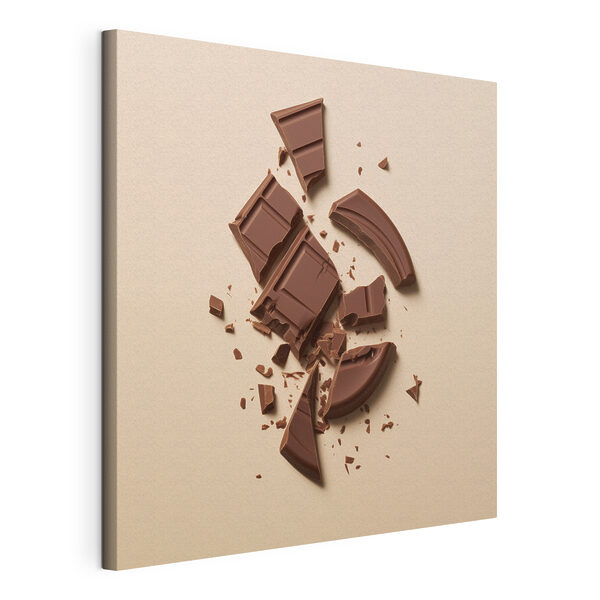 Broken chocolate bar on a pink surface Broken chocolate bar on a pink surface