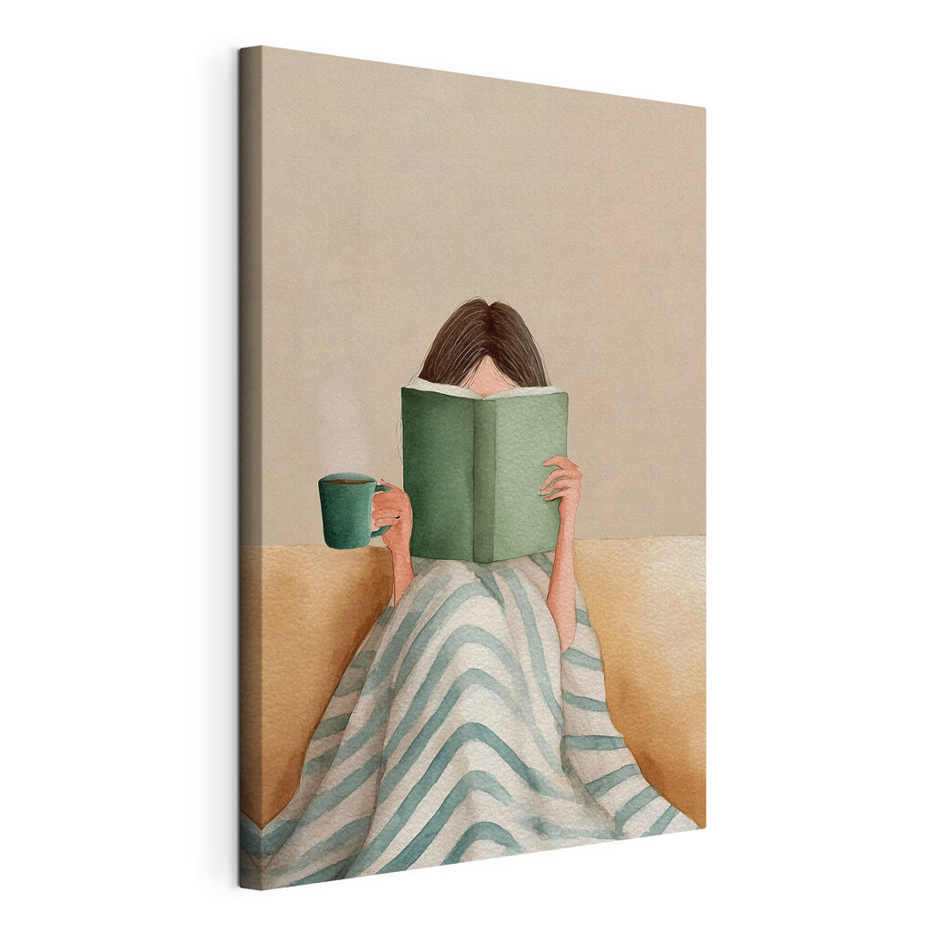 Woman reading a book and holding a cup Woman reading a book and holding a cup