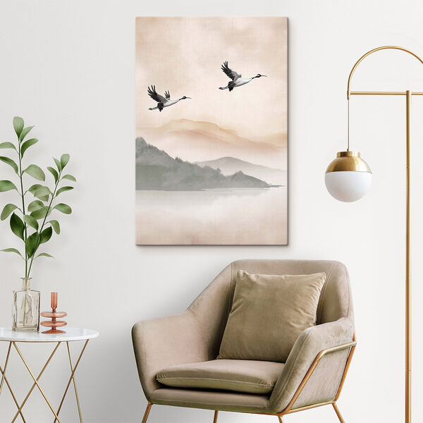 Two birds flying over a lake